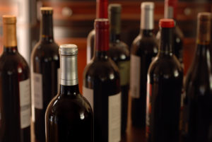 Still life of wine bottles with soft lighting and shallow dof.